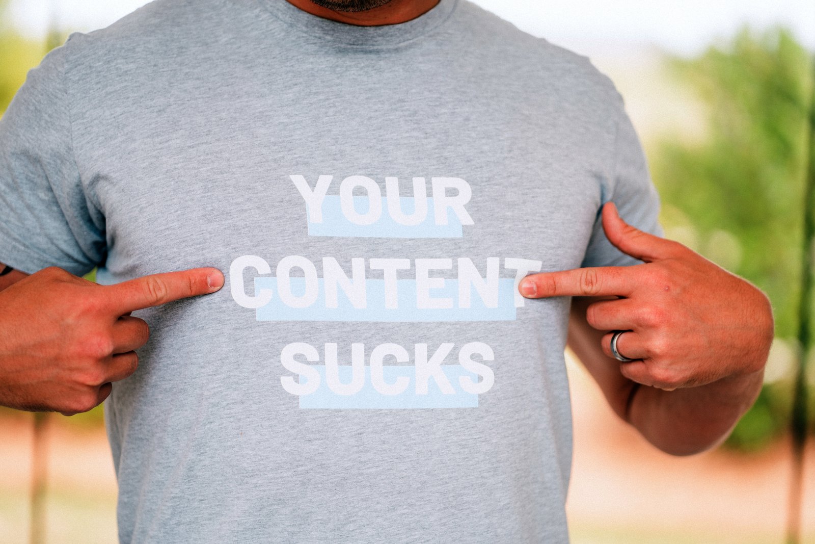 Heights Digital Your Content Sucks shirt — bold San Antonio marketing agency producing custom video, photography, drone content, and AI-scaled social media for small businesses